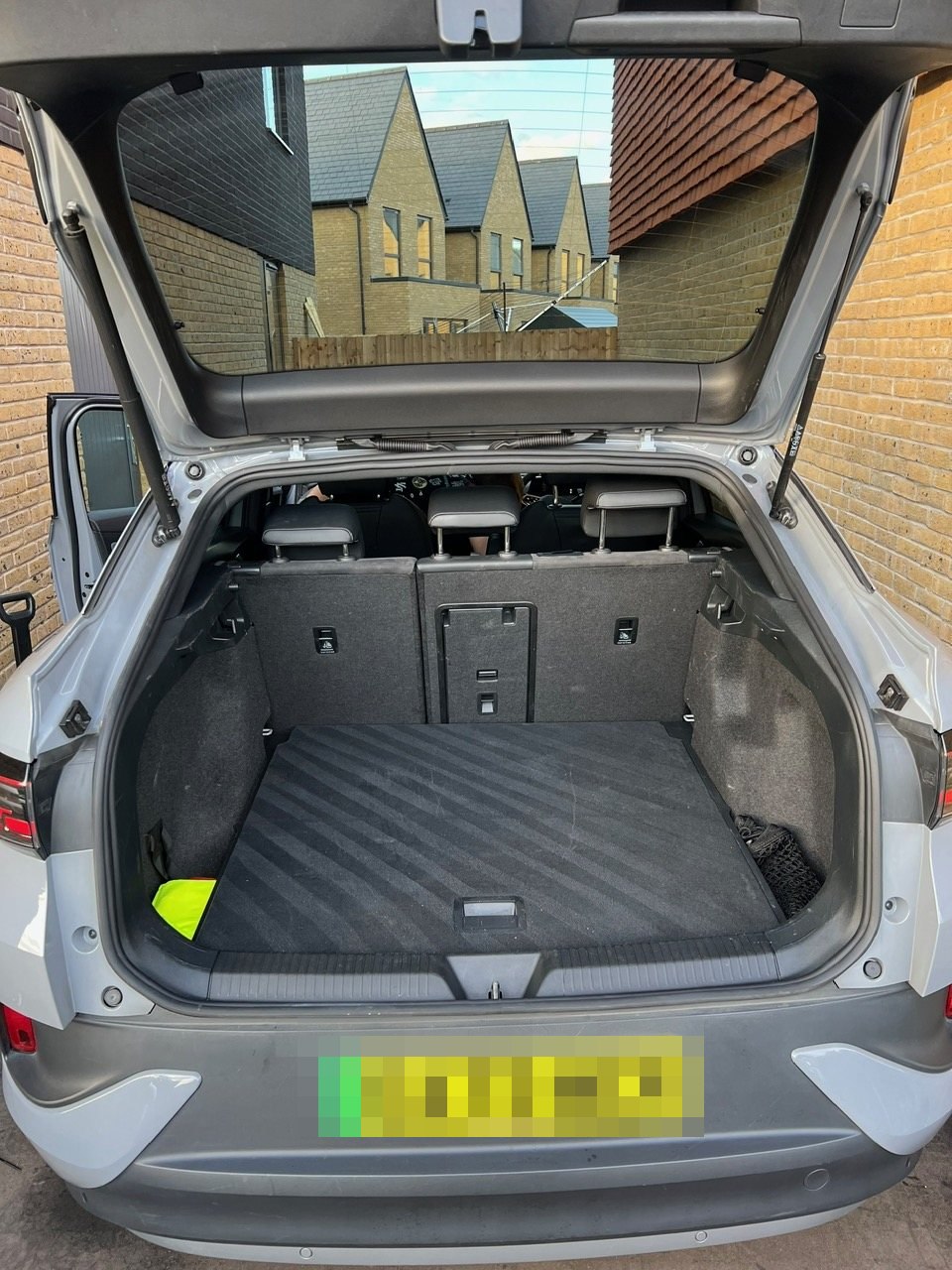 The same Volkswagen ID.5 boot after cleaning, vacuumed with precise carpet lines